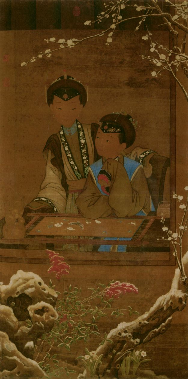 A long hanging scroll painting depicting two young women in loose, embroidered robes and dark-fur winter hats, bonding over a work of embroidery. As if viewed from a garden, a window frames the scene; the window is in turn framed by a snow-dusted blossoming plum tree.