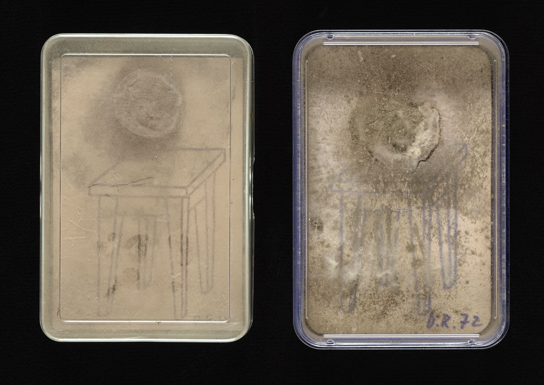 A small yellow worn out carboard box from it is early years to an older version of the yellow worn out cardboard box