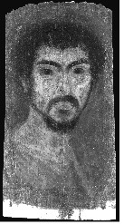 Grayscale image of a portrait of a man with dark curly hair, deeply curved eyebrows, and a goatee beard with a thin, curved mustache.