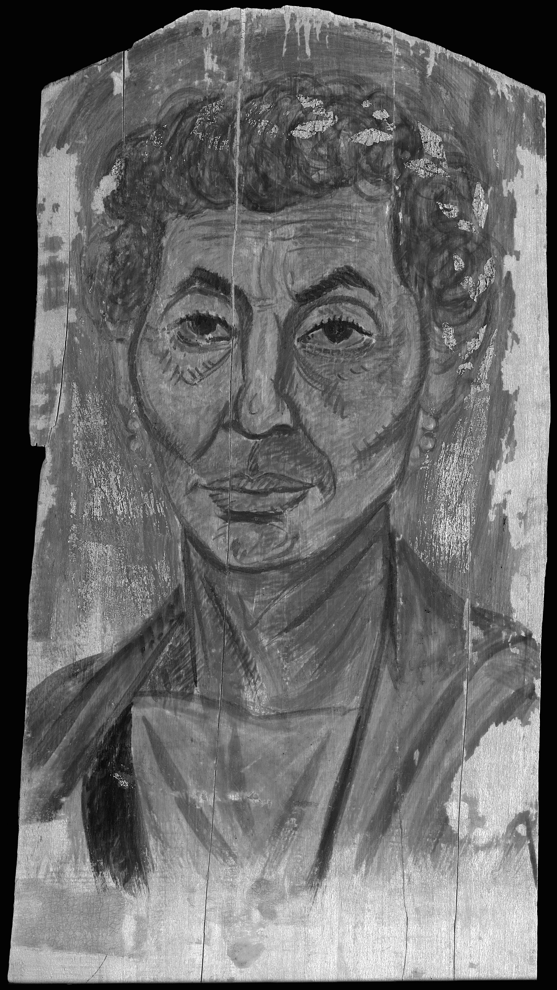 Grayscale image of a portrait of an older individual with short curly hair and apparent wrinkles on the face and wreath headdress on their head.