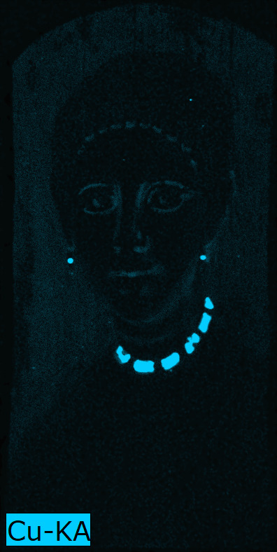The image is completely dark except for the woman's necklace and earrings that appear in bright blue.