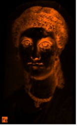 Portrait of a woman where her hair, eyes, and necklace appear in bright orange indicating the presence of iron pigments in these areas.