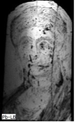 Grayscale image of the portrait of a woman. Most of the image appears light grey or white indicating the presence of lead across the entire painting and making it difficult to make out the facial features.