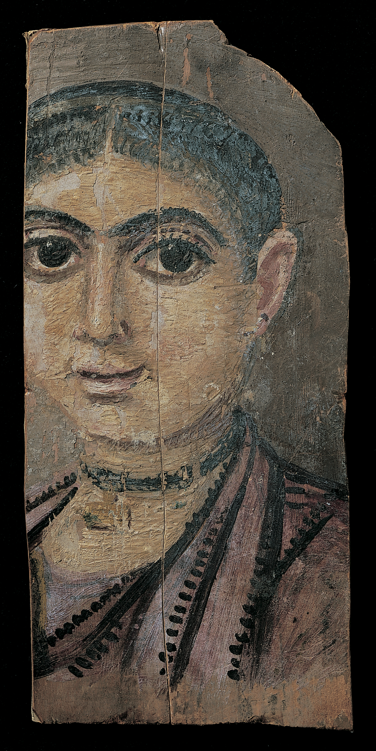 Partial portrait of a woman. The board or boards where her right cheek and ear would have been present are missing. She has a rounded face, textured hair that is pulled back, prominent dark eyebrows, big dark eyes, a long nose, and a small mouth. She wears a purple tunic and a chocker-like necklace with a central pendant.