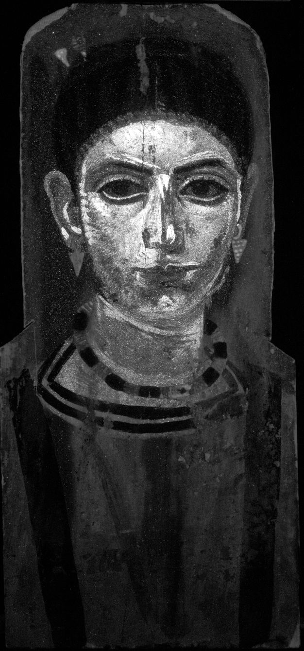 Black and white VIL image featuring bright white across the face and neck of the portrait. 