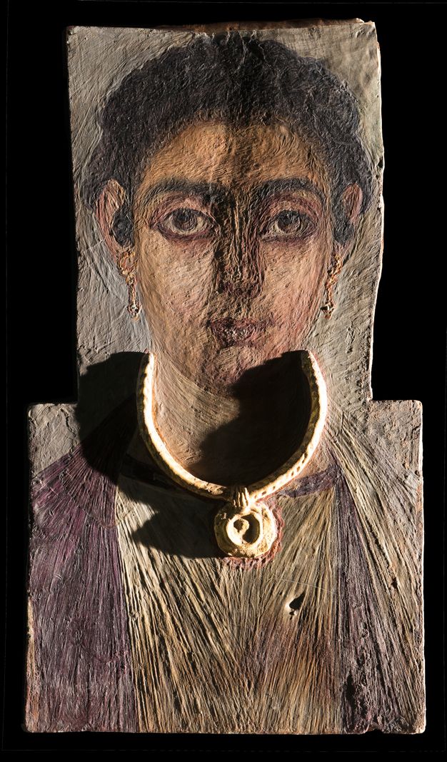 Portrait of a woman under raking light showing the texture of the surface. The necklace is notably raised as it casts a shadow across the woman's neck.