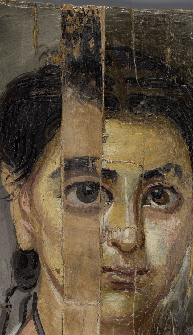 Detail of the child's portrait showing a close up of the child's face. The portrait appears less warm with more muted and cool tones. The child's right left eye appears bigger, and the eyebrow higher than its counterpart.