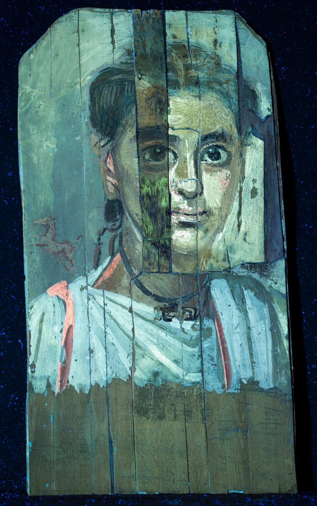 UVF imaging of the child's portrait. The image appears with a blue tint. 