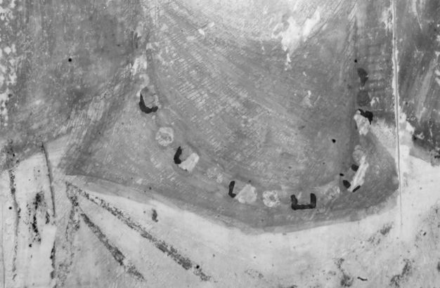 IRR image of figure 5.2 showing a distinct outline, a half rectangle in shape, that guided the placement of each of the green-blue beads of the necklace.