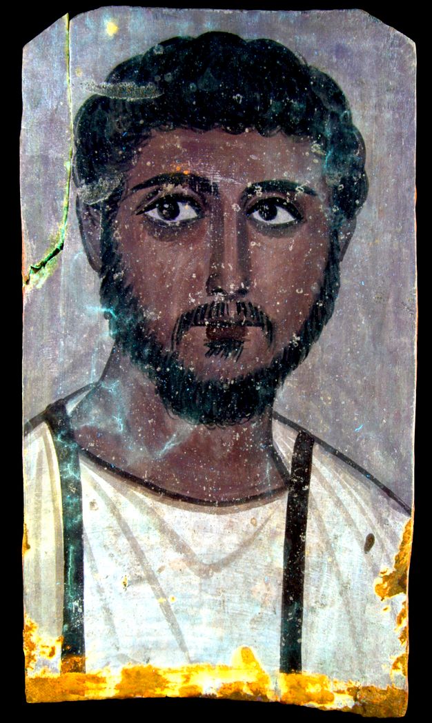 UVF image for figure 5.1. The man's skin and hair appear darker and his white garment appears lighter. There is a bright blue hue shown across the image, specifically near the bottom left side and the upper right corner of the man's face. The hue also appears on his white garment and on the left side of the brown detailing. 