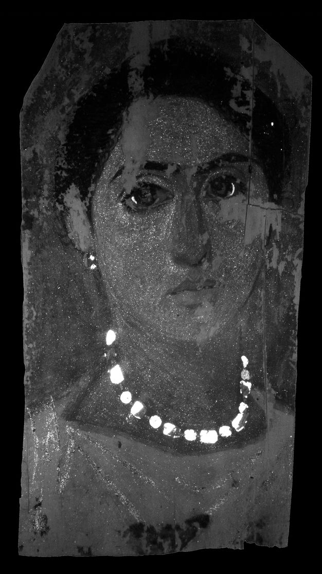 VIL image of figure 5.2. The beads in the necklace, earrings, and a crescent shape around the irises appear in a vibrant white against the gray and black of the rest of the portrait. There are also flecks of white in the skin and in the folds of the tunic.