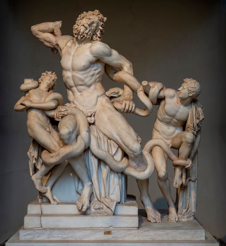 Marble sculpture of a muscular, bearded man writhing as snakes wrap around his body. Two younger men, smaller in scale, stand to either side of the main figure, also struggling with the snakes.