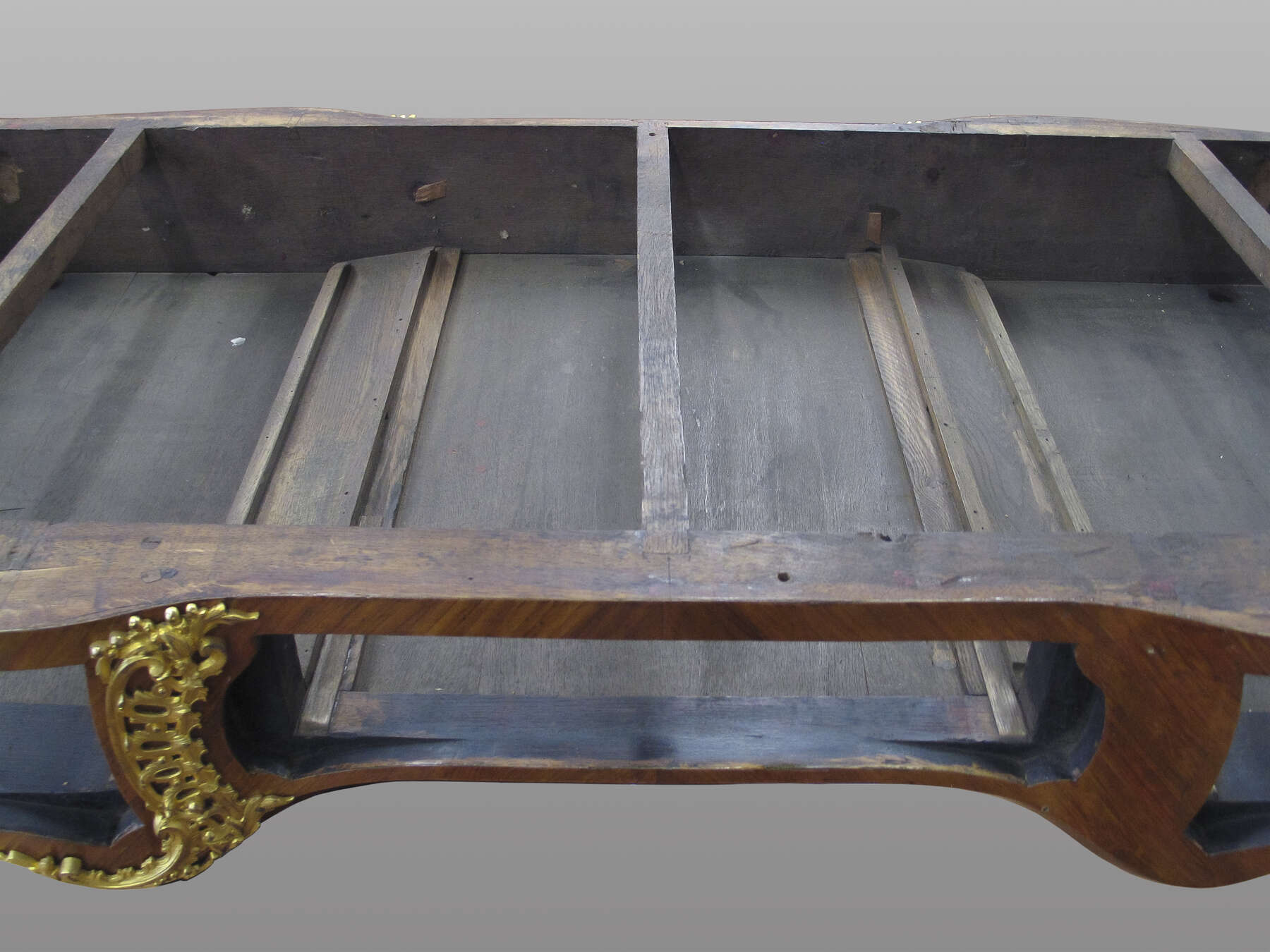 the case constructed of multiple horizontal and vertical strips of wood