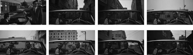 Eight black and white images. The first image shows one man in a suit sitting in the driver’s seat with his back turned and a second man in a suit standing at the passenger-side door. Seven images show the two men driving in a car facing the camera.