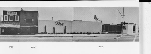 Two black-and-white photos printed next to each other show the white façade of a building, on which a sign says “The.”