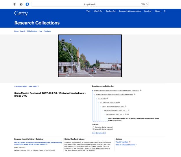 A screenshot from a website showing seven black-and-white photos of a street scene, accompanied by written information about the photos.