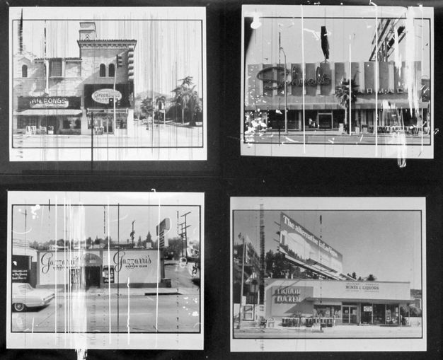 A contact sheet shows four black-and-white photos of store façades shot from the street. Each photo has scratches on its surface.