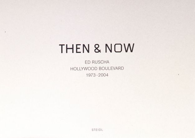The inside cover of a book featuring a blank, white page and the text “Then & Now/ Ed Ruscha/Hollywood Boulevard/ 1973-2004.”