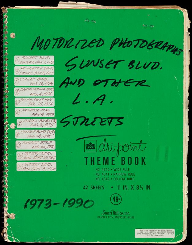A green spiral notebook cover with text written on it in green pen reading “motorized photos/ sunset boulevard/ and other L.A./Streets, 1973-1990.”
