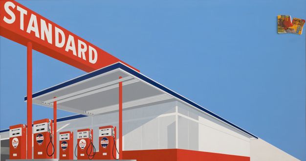 A painting of a red-and-white gas station with a sign reading “Standard” against a blue sky. A trompe l’oeil torn magazine appears in the upper right corner.