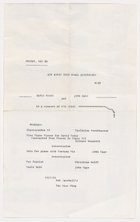 White page with black typewritten text in English covering middle section of page; top and bottom blank. Top half of text contains time, date, and location of concert. Center reads “David Tudor and John Cage in a concert of New Music” followed by a long drooping line of typed asterisks. Bottom half of text lists the program of pieces to be performed.