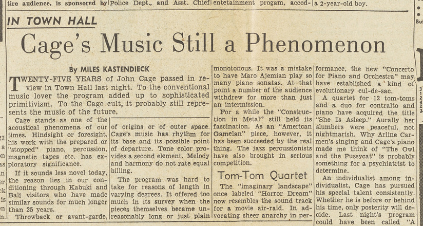 Horizontal rectangular press clipping containing four columns of text in English. Title “Cage’s Music Still a Phenomenon” covers entire top of clipping in large font.