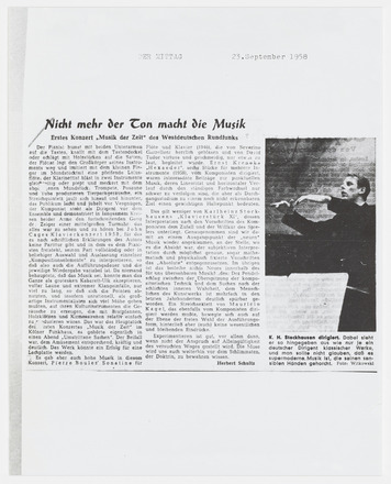 Photocopy of press clipping containing three columns of text in German and one photo on white page. Title “Nicht mehr der Ton macht die Musik” across top of leftmost two columns in bold font. Black-and-white photograph of a man in black, hands raised as if conducting, covers entire rightmost column. Captioned “K. H. Stockhausen dirigiert.” Photocopy covers half of the page.