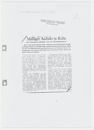 White page with black-and-white photocopy of a vertical rectangular German news clipping. Top third of page features date and time in typewritten text at left and a black ink stamp at center. Two columns of text, below the title “Mäßiger Auftakt in Köln: Drei Premieren, darunter eine mit Wäscheklammern,” cover the bottom three-quarters of the page.  