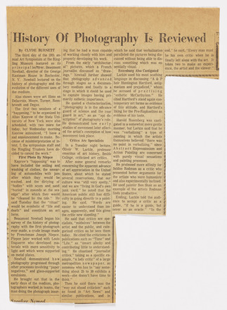 Newspaper clipping with four columns of text. “History of Photography Is Reviewed” at top across columns. First two columns the length of one half page, third, half as long as first two, and the last, only five lines long. Kaprow’s performance discussed near top of first column in one paragraph. 