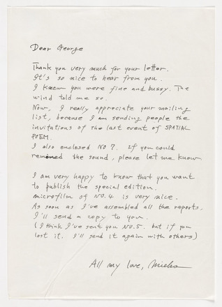 Grey, white-flecked page with black handwritten text in English addressed “Dear George” at top left followed by text column that fills the length of the page. Signed “All my love, Mieko” below text, aligned right.