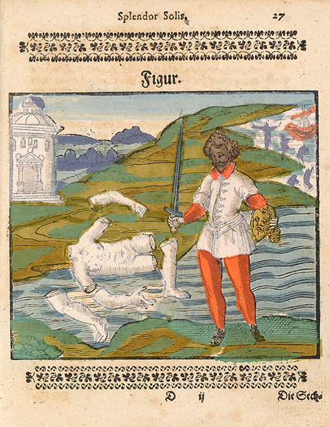 A man holding a golden head and a sword stands before a dismembered corpse that is colored white like salt