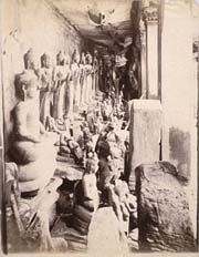 Basset/Buddhist sculpture in storage area at Angkor, Cambodia 