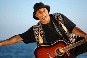 Storyteller Makinto with his guitar